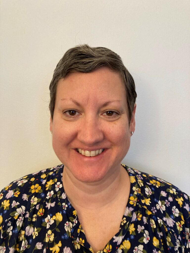 Photo of Danielle Scaturro smiling at the camera.